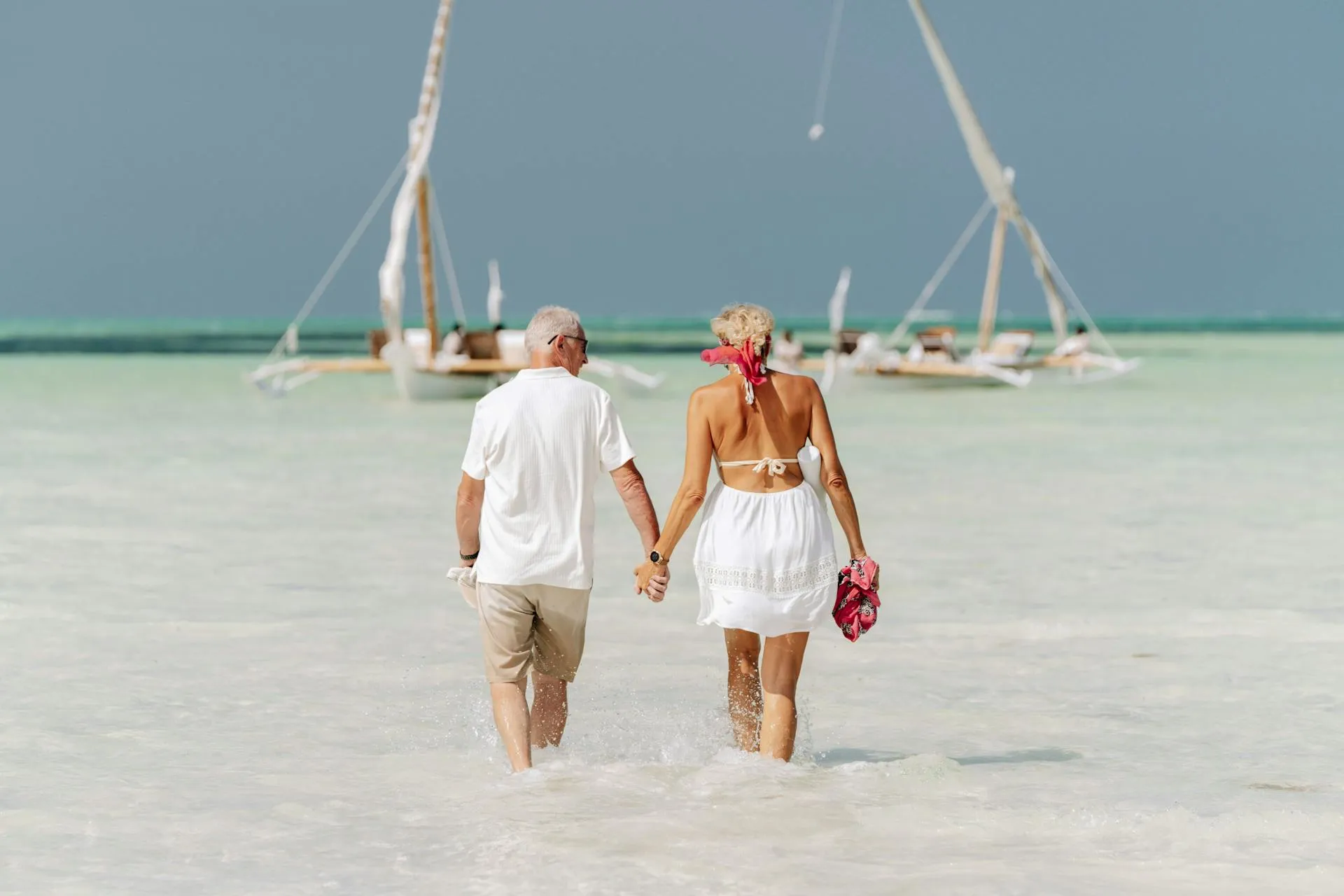 Couple enjoying the 11-Day Tanzania and Zanzibar Safari Experience with unforgettable wildlife adventures and relaxing Zanzibar beaches.