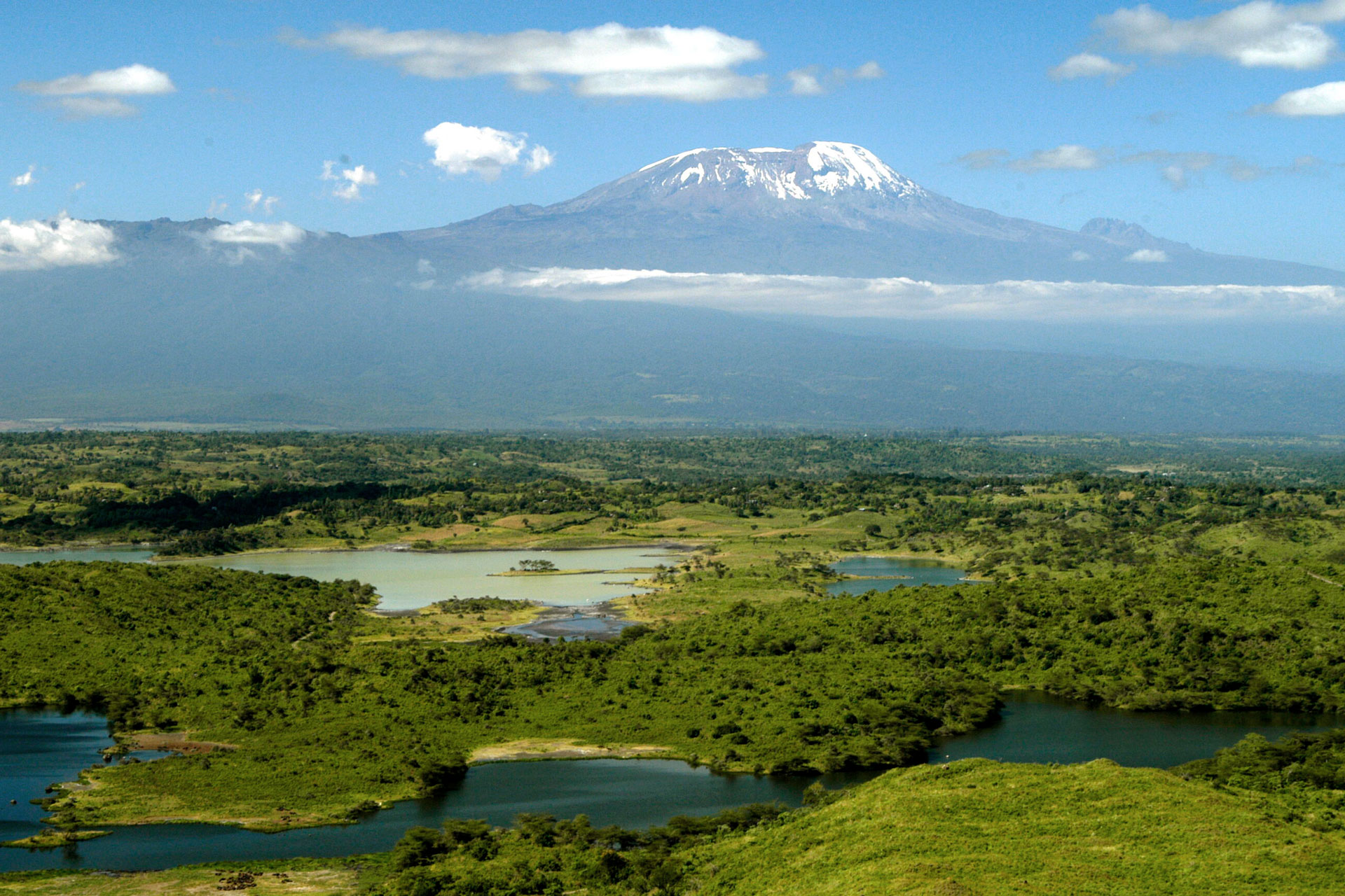 Arusha National Park - Mount Meru View with the majestic mountain rising above Tanzania's scenic forest and savannah landscapes
