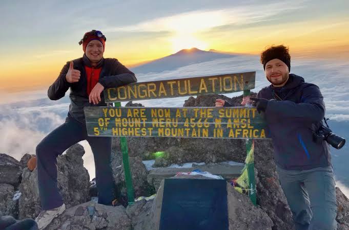 On Top of Mount Meru Tanzania at the summit overlooking Arusha National Park and northern Tanzania