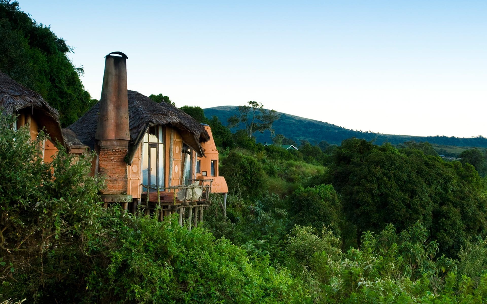 andBeyond Lodge near Ngorongoro Crater Tanzania surrounded by highland landscapes and volcanic scenery